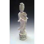 A Chinese blanc de chine figure of Guanyin, height 47cm.