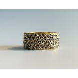 An18ct gold wide band ring set with five hoop rows of diamonds 9.6gm Makers mark LWJCondition