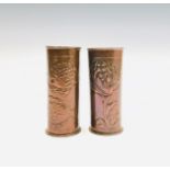 Two Newlyn style copper vases, one decorated with fish, the other with a floral design, both
