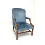 A Gainsborough type mahogany library armchair, upholstered in blue foliate decorated velvet.