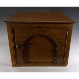 An early 20th century oak box. Height 30.5cm, width 39cm, depth 39cm.