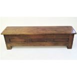 A Brittany oak joined chest, the front with three narrow panels, on stile feet, height 48cm, width