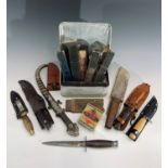 A Japanese explorer custom hunting knife, in leather sheath, 22cm, assorted other knives and a