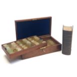 Microscopy. A mahogany cased set of early 20th century microscope slides, together with a book '