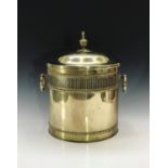 A Regency design brass coal bin of cylindrical form, the lift in the form of an urn. Height 43cm.