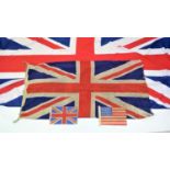 Two D Day flags - Union Jack and Stars and Stripes, both approx. 21cm x 30cm, together with a