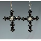 A pair of Herve Van Der Staeten earrings, black and glass and diamanté crucifixes, purchased from