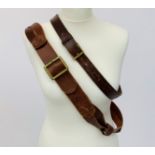 One brown leather 1.5" belt by Mulberry, marked 34/85, together with one other vintage brown leather