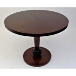 A Nina Campbell mahogany circular table, with ebonised stringing and decoration, on inverted
