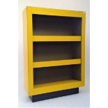 A vintage yellow formica ex GPO open cabinet, height 153cm, width 108cm, depth 36cm.Condition