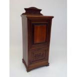 A late Victorian walnut music cabinet, 117 x 50cm.