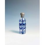 A Victorian cut overlay glass perfume bottle with hinged silver lidCondition report: The glass is