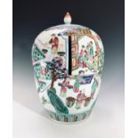 A Chinese famille verte jar and cover, height 32cm.