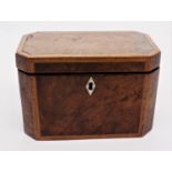 A George III burr elm veneered tea chest, of canted rectangular form, with twin lidded