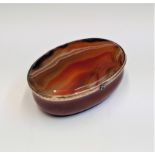 A choice gold mounted agate box with a tiny sapphire thumbpiece 62mm wideCondition report: No damage