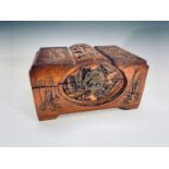 A Chinese carved camphor wood miniature chest, height 14cm, width 25cm.