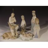 A collection of Nativity themed Lladro ornaments comprising models No. 4670 'Nino', No. 4671 'Virgen