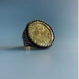 A 1925 Half-Sovereign 9ct gold ring 10.4gm