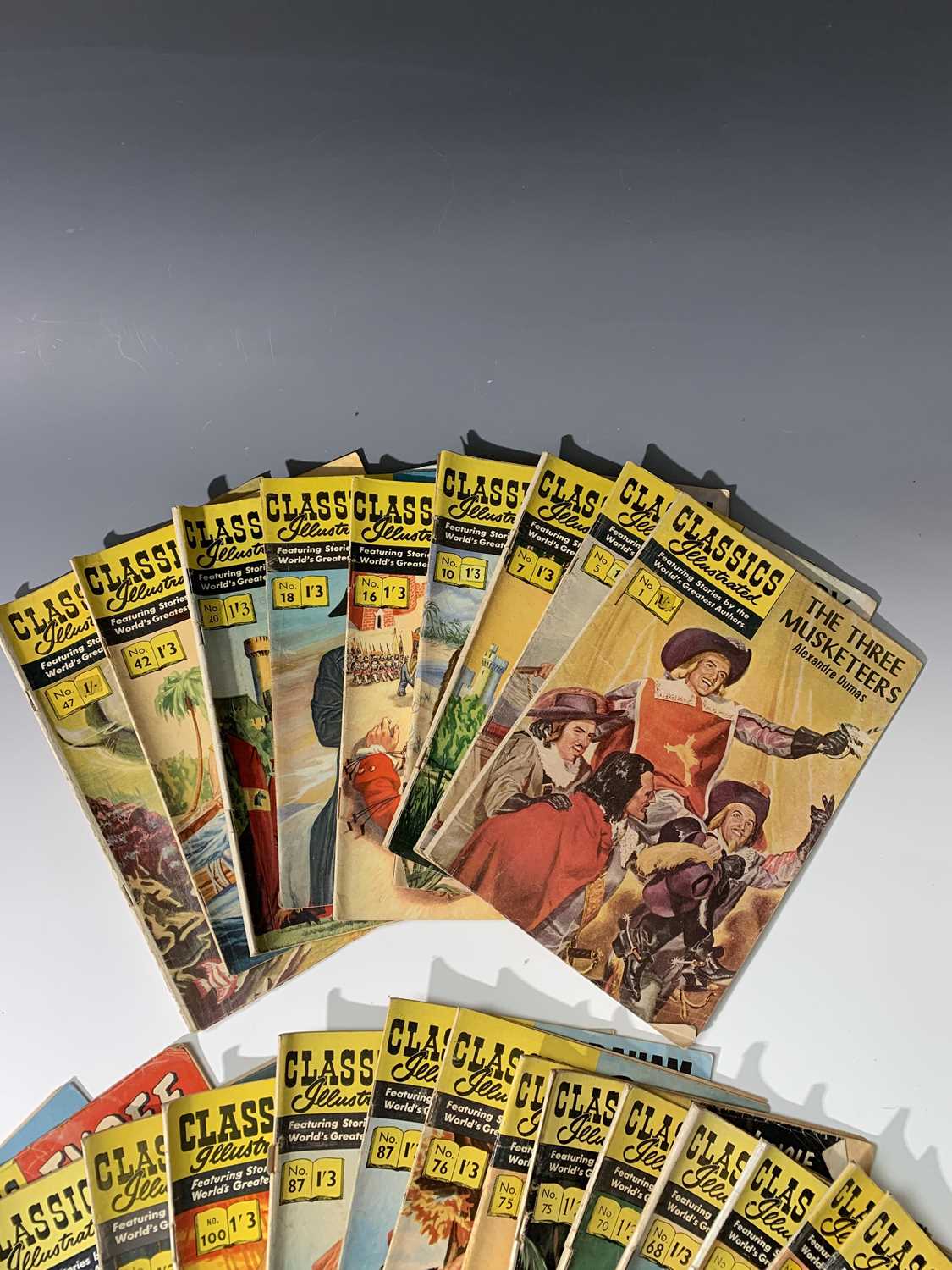COMICS. "Classics Illustrated." 28 numbers. Number one noted, "The Three Musketeers," 1943 good
