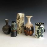 Two pieces of Celtic Pottery, a Carn Pottery vase, a Simon Rich vase and a Mary Rich vase. (5)