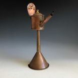 A copper pilchard oil wick lamp or chill, height 28.5cm.