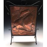 An Arts & Crafts period Eustace Brothers of Hayle copper and wrought metal fire screen, embossed