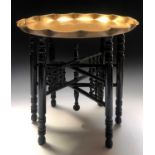 An Art Nouveau period brass tray on stand by J & F Pool of HayleDiameter of tray 57.5cm, overall