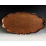 An Art Nouveau period Cornish art copper tray of oval form by J.F.Pool of Hayle47 x 25cm