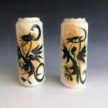 Celtic Pottery, Newlyn - two Folk pattern cylindrical vases each decorated with a phoenix, height