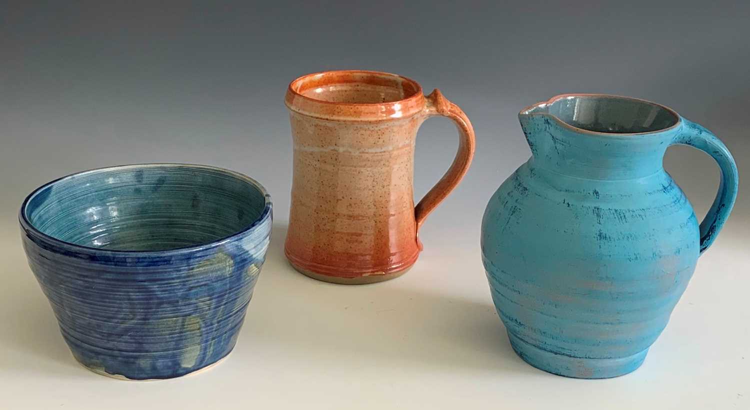 A Truro Pottery glazed stoneware tankard, a Bert Middleton (Looe) jug - both with impressed marks to