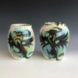 Celtic Pottery, Newlyn - two Folk pattern vases each decorated with a phoenix, 14cm and 14.5cm in