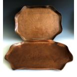 A pair of Cornish art copper trays of octagonal form, attributed to the Eustace brothers of Hayle,