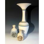 A John Buchanan vase, height 41cm, together with two Tolcarne Pottery bottle vases by Roger Veal.