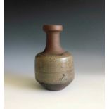 A Janet Leach bottle neck vase, impressed makers mark and Leach Pottery seal, height 16cm.