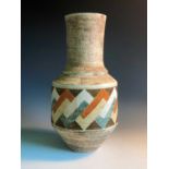 A Troika urn vase with geometric decoration, initialled by Alison Brigden and signed 'Troika',