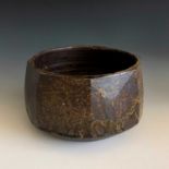A Janet Leach stoneware studio pottery bowl with cut sides and ash glaze, maximum diameter 18cm,