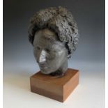 Peter EVELEIGH (1943-2020)A bronzed study of a female head, on wooden plinth Height 37cm