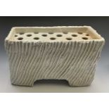 Sarah WALTON (b.1945)A large stoneware flower brick of rectangular form with raised and incised