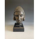 A bronzed study of a female head, on wooden plinth. Height 37cm.