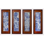 A set of four Chinese blue and white porcelain plaques, Republic Period, painted with scenes of “