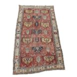 A Soumakh carpet, East Caucasus, the madder field with polychrome medallions, animals and guls,