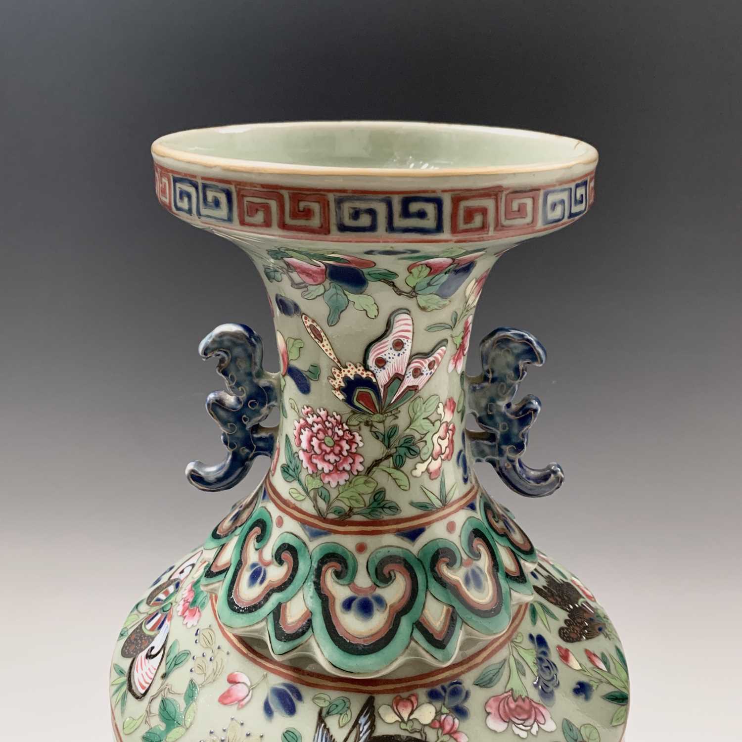 A Chinese Canton twin-handled celadon vase, 19th century, with butterflies amongst foliage above - Image 2 of 27