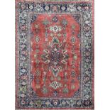 A Mahal Carpet, West Persia, the madder field with a polychrome lobed medallion, flowerheads and