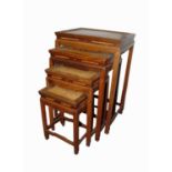 A Chinese hardwood quartetto of tables, with burl wood rectangular tops on legs of square section,