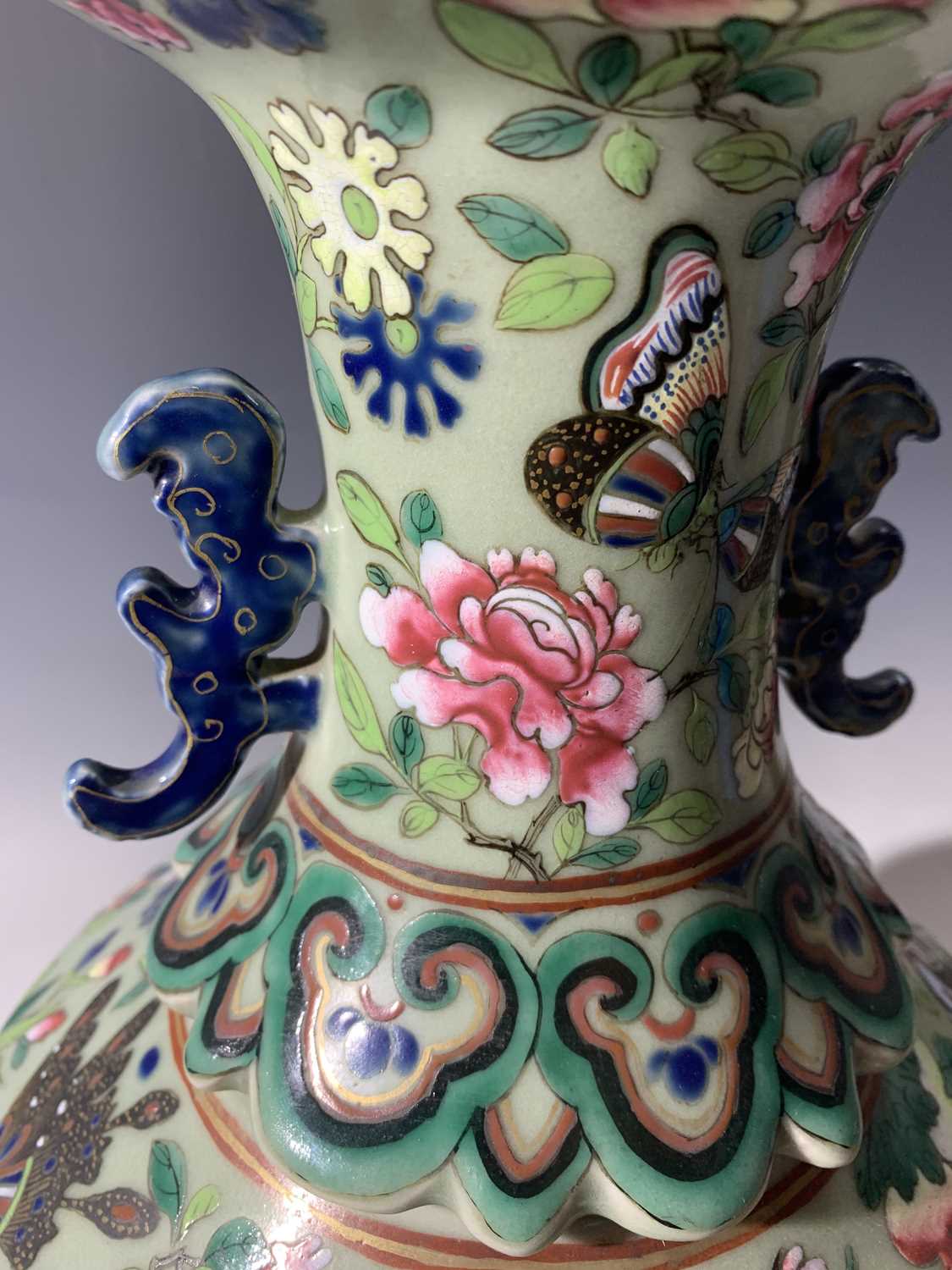 A Chinese Canton twin-handled celadon vase, 19th century, with butterflies amongst foliage above - Image 22 of 27