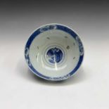 A Chinese blue and white porcelain bowl, the exterior decorated with medallions enclosing the Daoist