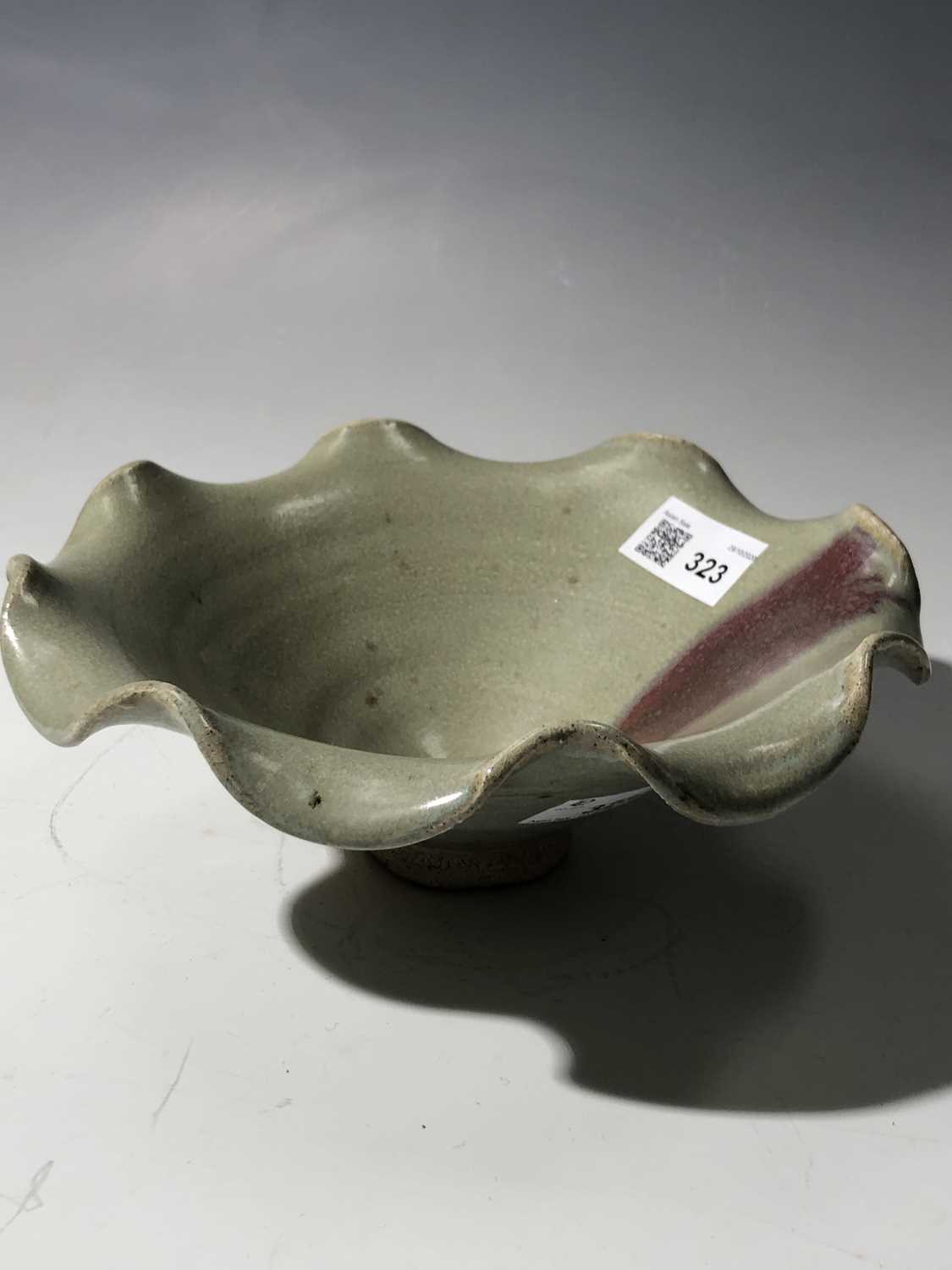 A footed pottery celadon glazed bowl, with scalloped rim, height 8.5cm, diameter 20cm.Condition - Image 6 of 7