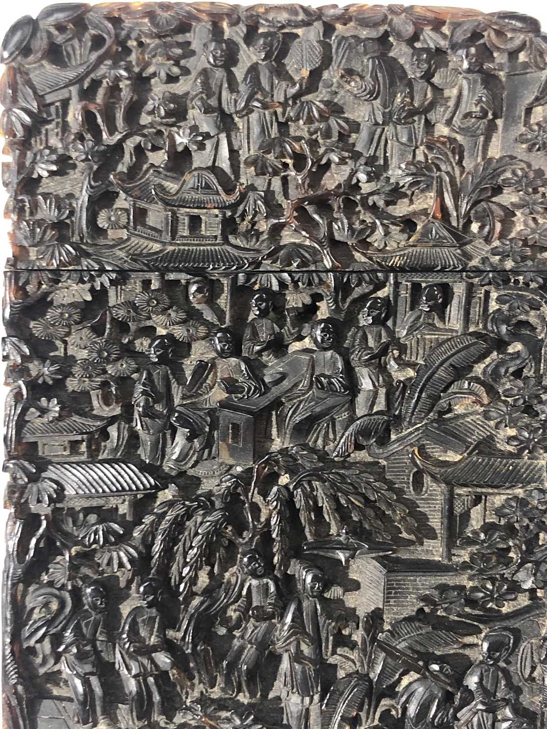 A Chinese tortoiseshell card case, 19th century, intricately carved with figures amongst buildings - Image 5 of 15