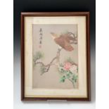 A Chinese silk embroidered picture of a bird of prey, perched on a branch, character marks and red