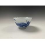 A Chinese blue and white porcelain bowl, 17th century, signed, the exterior with a water buffalo